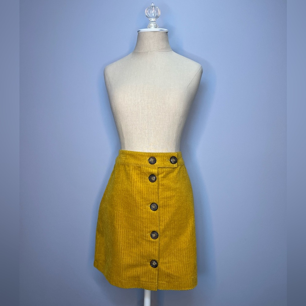 Mustard yellow corduroy skirt with large buttons